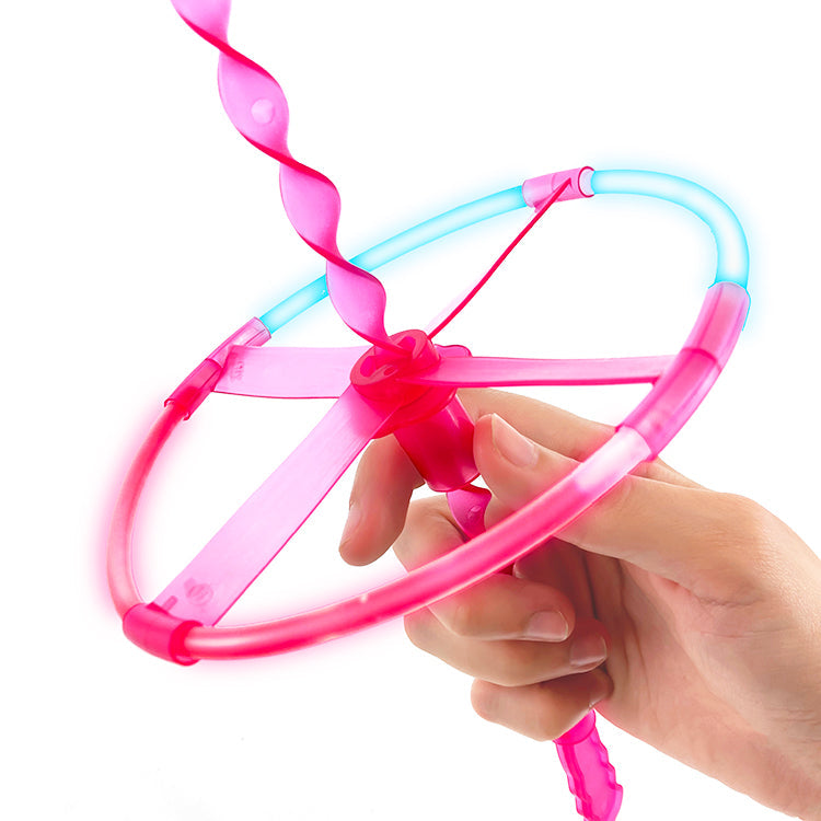 Juguete Divertido para Niños/as - Platillo Volador Resplandeciente con Lanzador